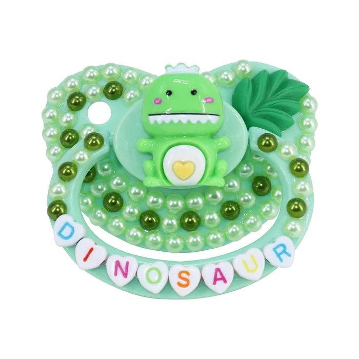 Vibrators Green Dinosaur Adult Pacifier The Kinky Peach